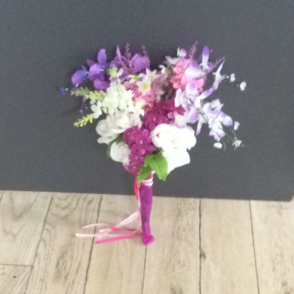 Beautiful wedding floral purple bouquet